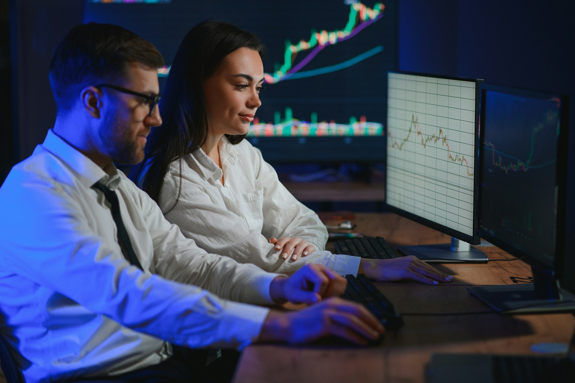 Business team investment working with computer, planning and analyzing graph stock market trading
